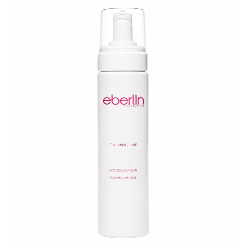 Mousse Calmante de Eberlin Biocosmetics, envase blanco de 200 ml con dispensador y tapa translúcida.